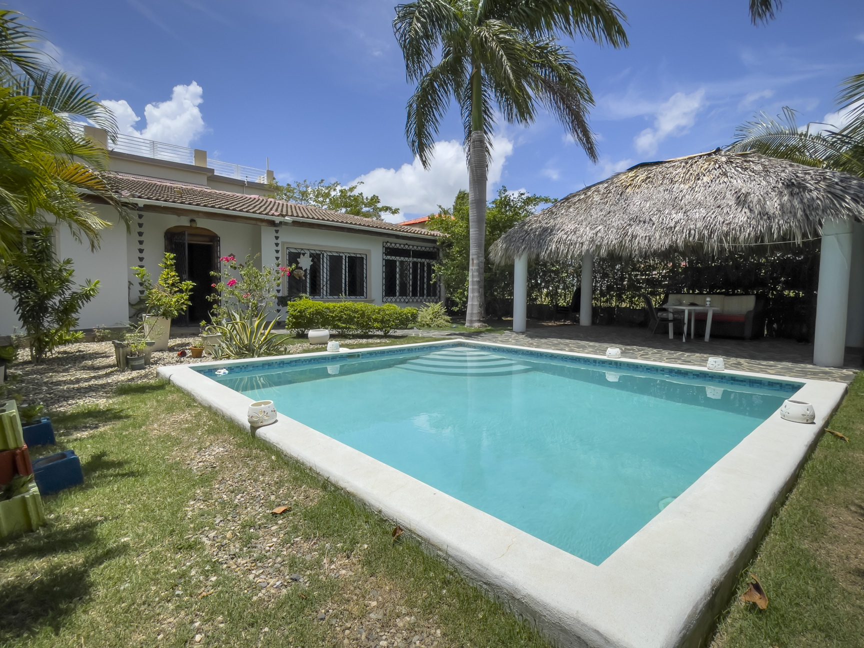 buyDRproperty 3 Bedroom Villa for sale with pool and palapa in a tropical setting. Sosua Real Estate