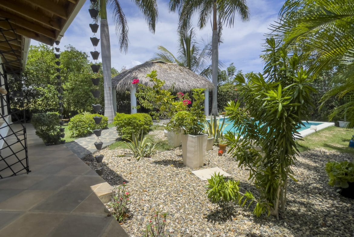 buyDRproperty Tropical backyard with pool and gazebo, perfect for a For Sale 3 Bedroom Villa. Sosua Real Estate