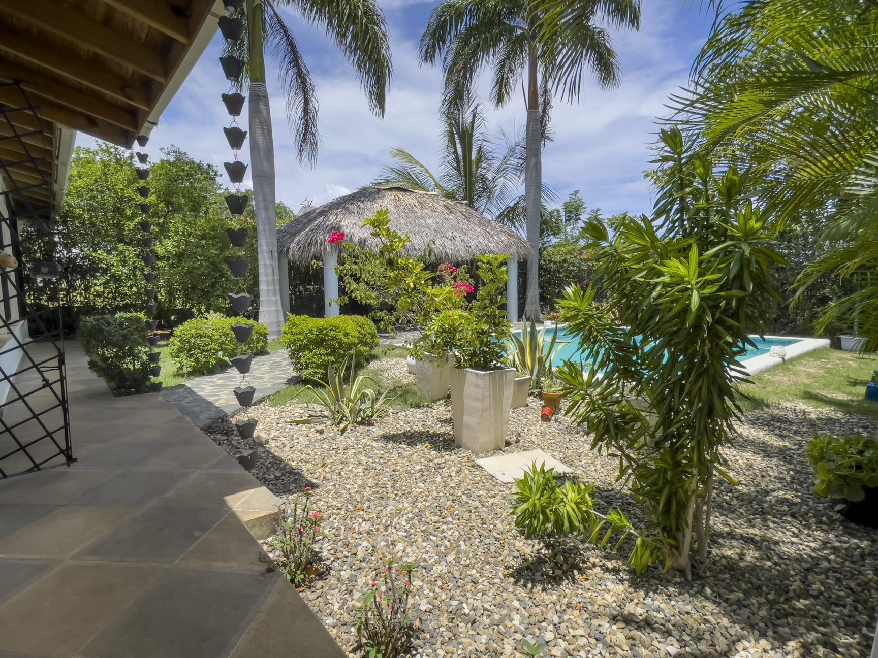 buyDRproperty Tropical backyard with pool and gazebo, perfect for a For Sale 3 Bedroom Villa. Sosua Real Estate