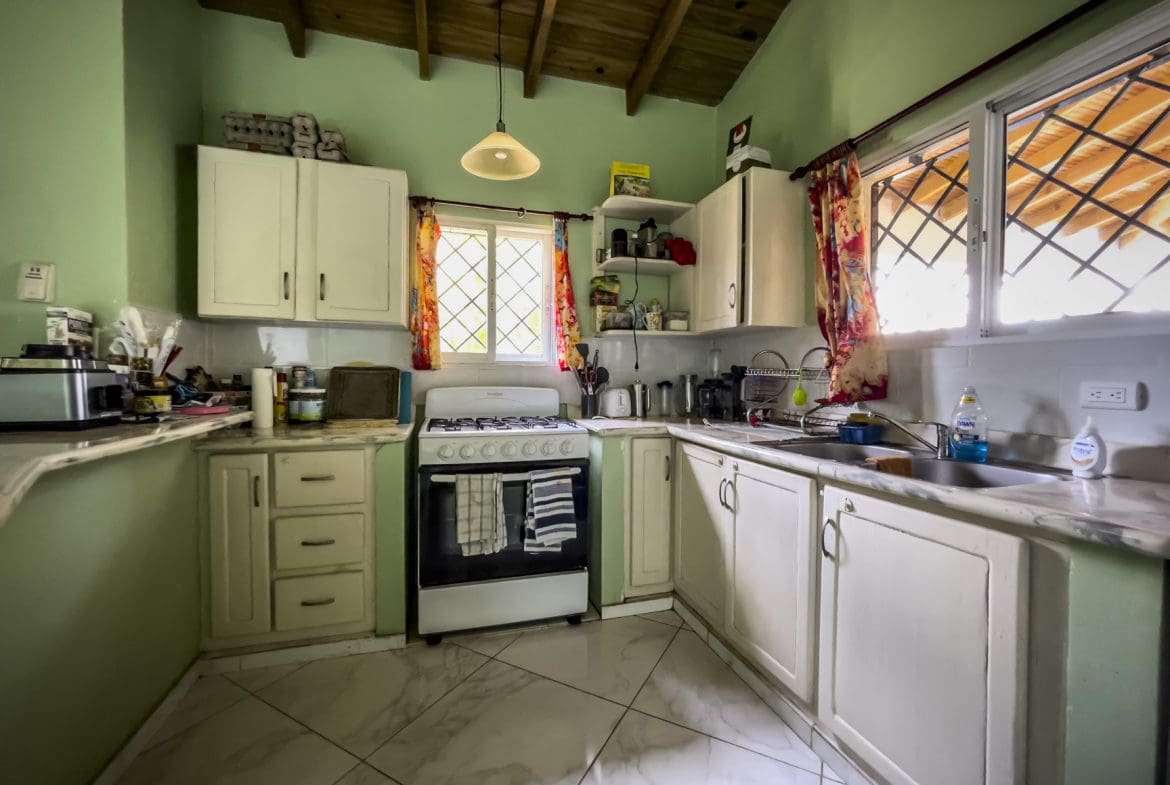 buyDRproperty Kitchen in a 3-bedroom villa for sale near the beach. Sosua Real Estate