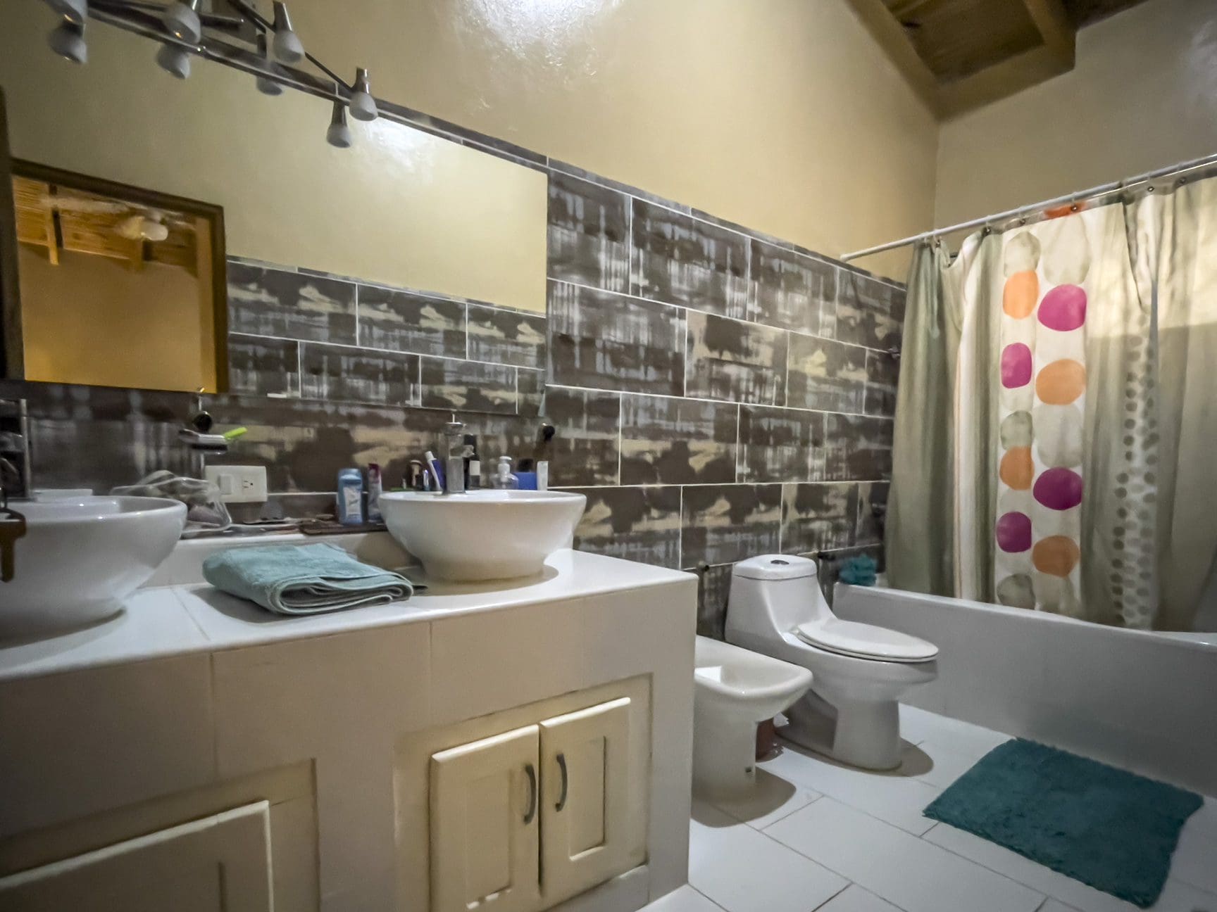 buyDRproperty Bathroom with vanity, toilet, and shower, part of a For Sale 3 Bedroom Villa. Sosua Real Estate