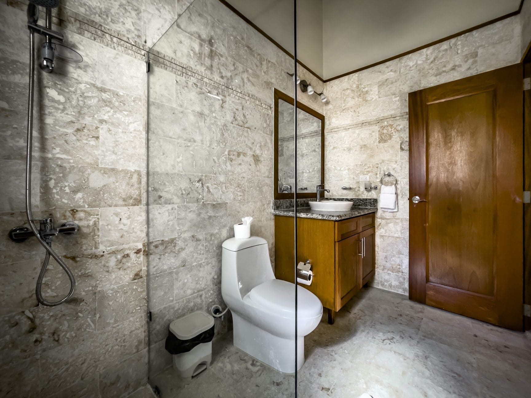 buyDRproperty Bathroom in a stunning 3 bedroom condo. Includes shower, toilet, and vanity. Sosua Real Estate