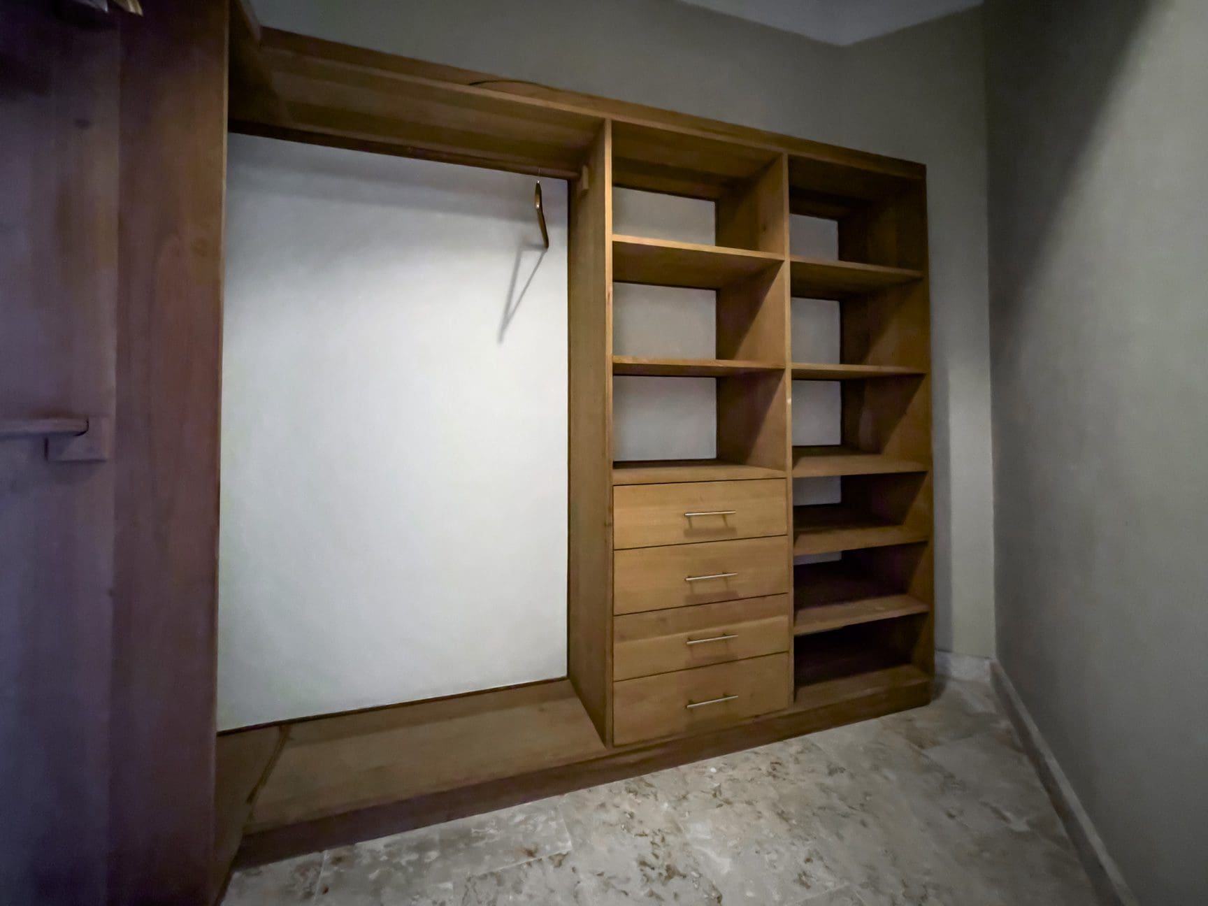 buyDRproperty Wooden closet with shelves and drawers in a stunning 3 bedroom condo Sosua Real Estate