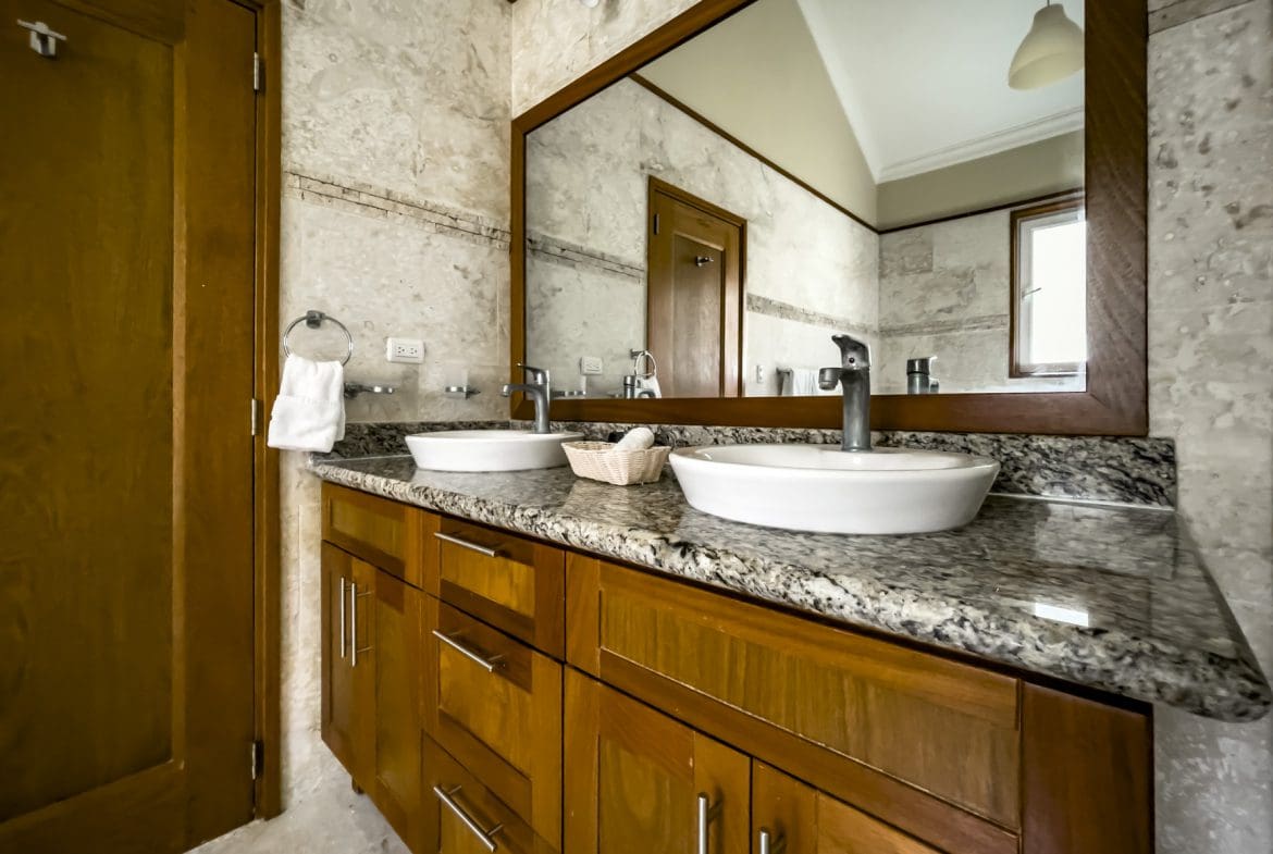 buyDRproperty Bathroom with double sink vanity in a stunning 3 bedroom condo. Sosua Real Estate