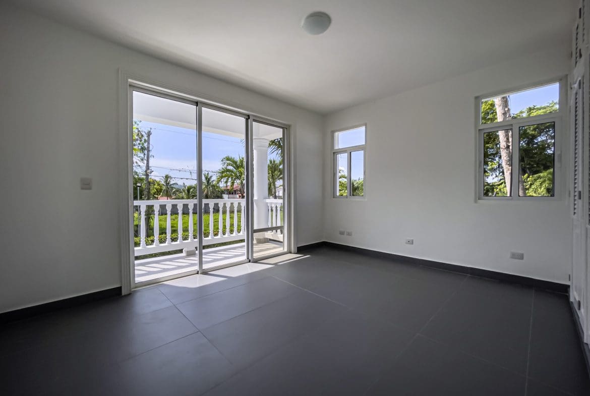 buyDRproperty Empty room in a new oceanfront 2-bedroom condo with access to the balcony Sosua Real Estate