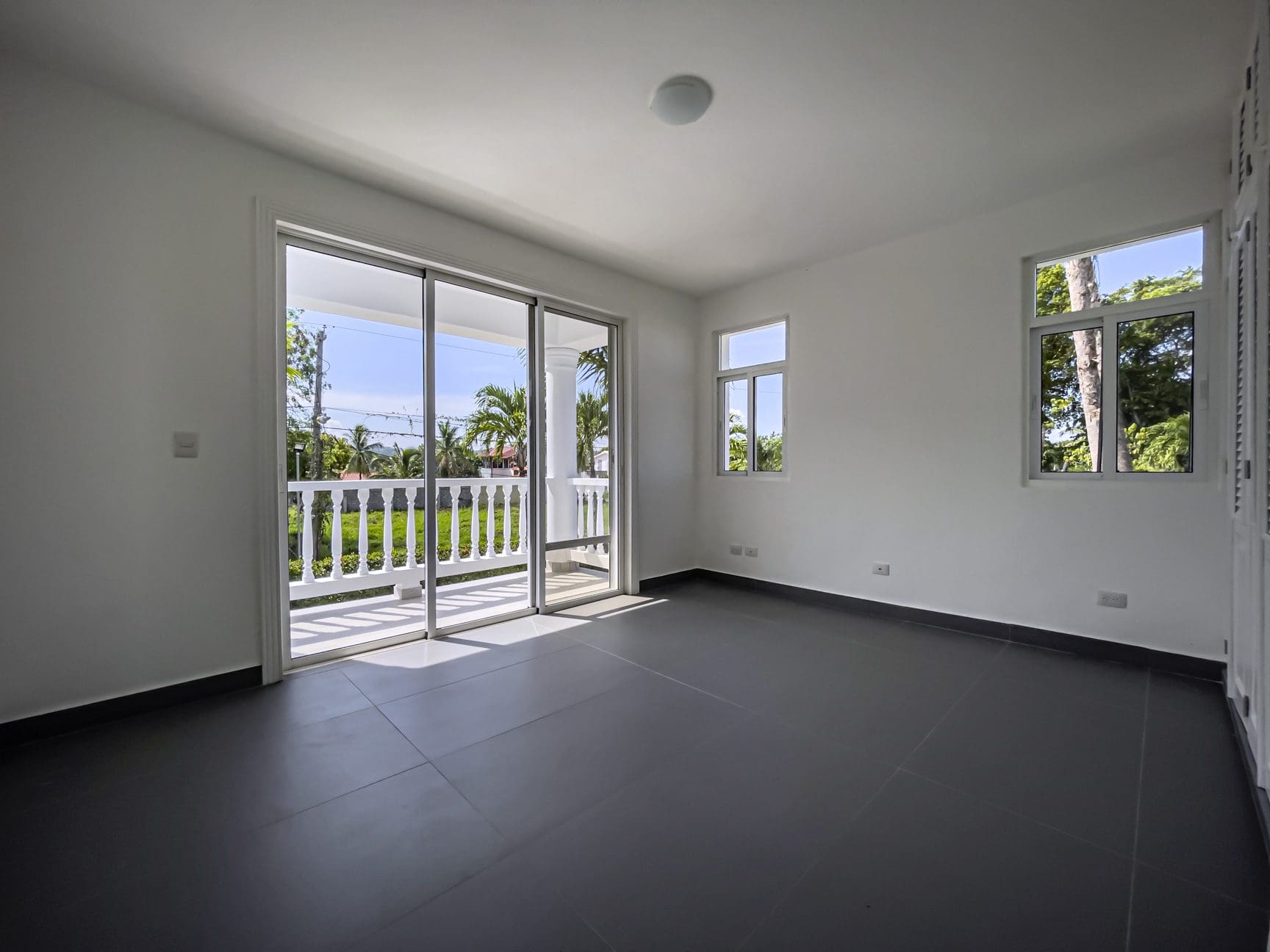 buyDRproperty Empty room in a new oceanfront 2-bedroom condo with access to the balcony Sosua Real Estate