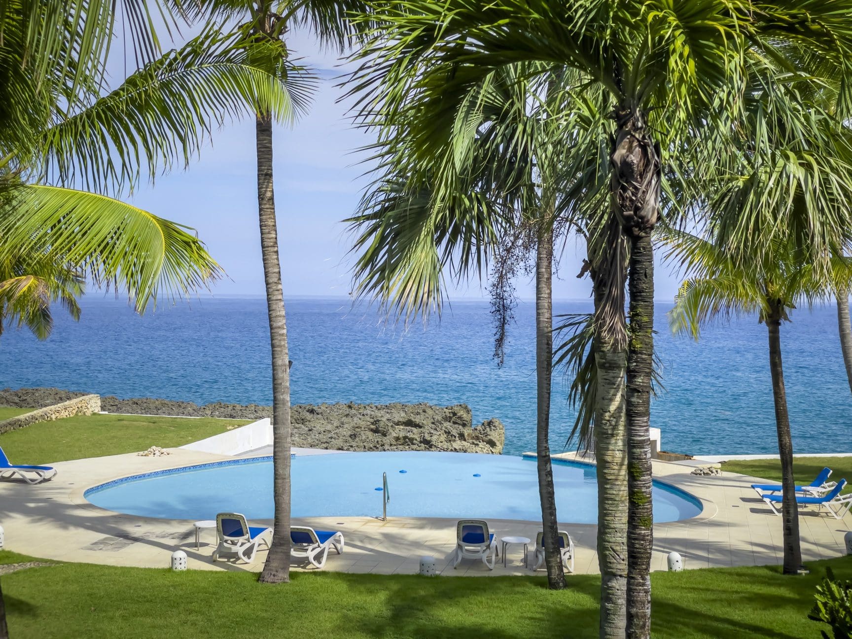 buyDRproperty Oceanfront view from a pool at 2 bedroom condos for sale. Sosua Real Estate