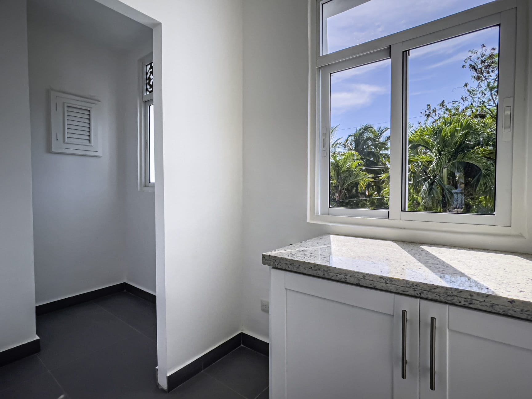 buyDRproperty Bright kitchen in an oceanfront condo with a beautiful view. Sosua Real Estate