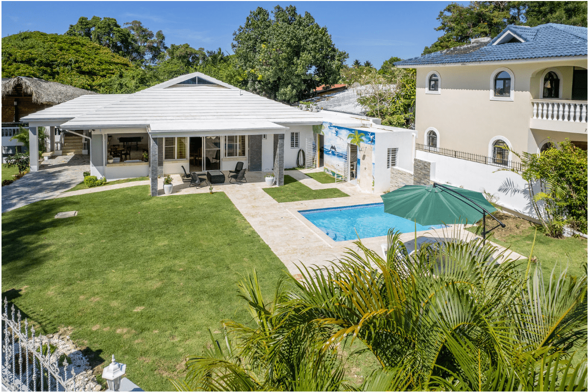 buyDRproperty Gorgeous 5 Bedroom Villa with a pool and green lawn. Sosua Real Estate