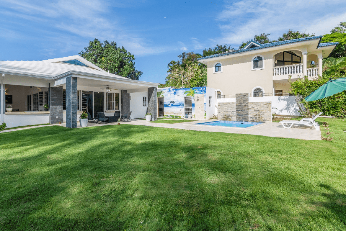 buyDRproperty Gorgeous 5 Bedroom Villa with pool and lush green lawn. Sosua Real Estate