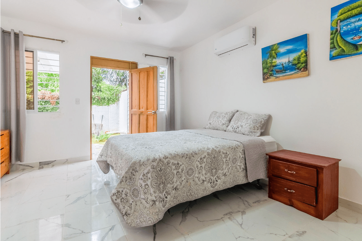 buyDRproperty Bedroom in a gorgeous 5 bedroom villa with a view of the outdoors. Sosua Real Estate