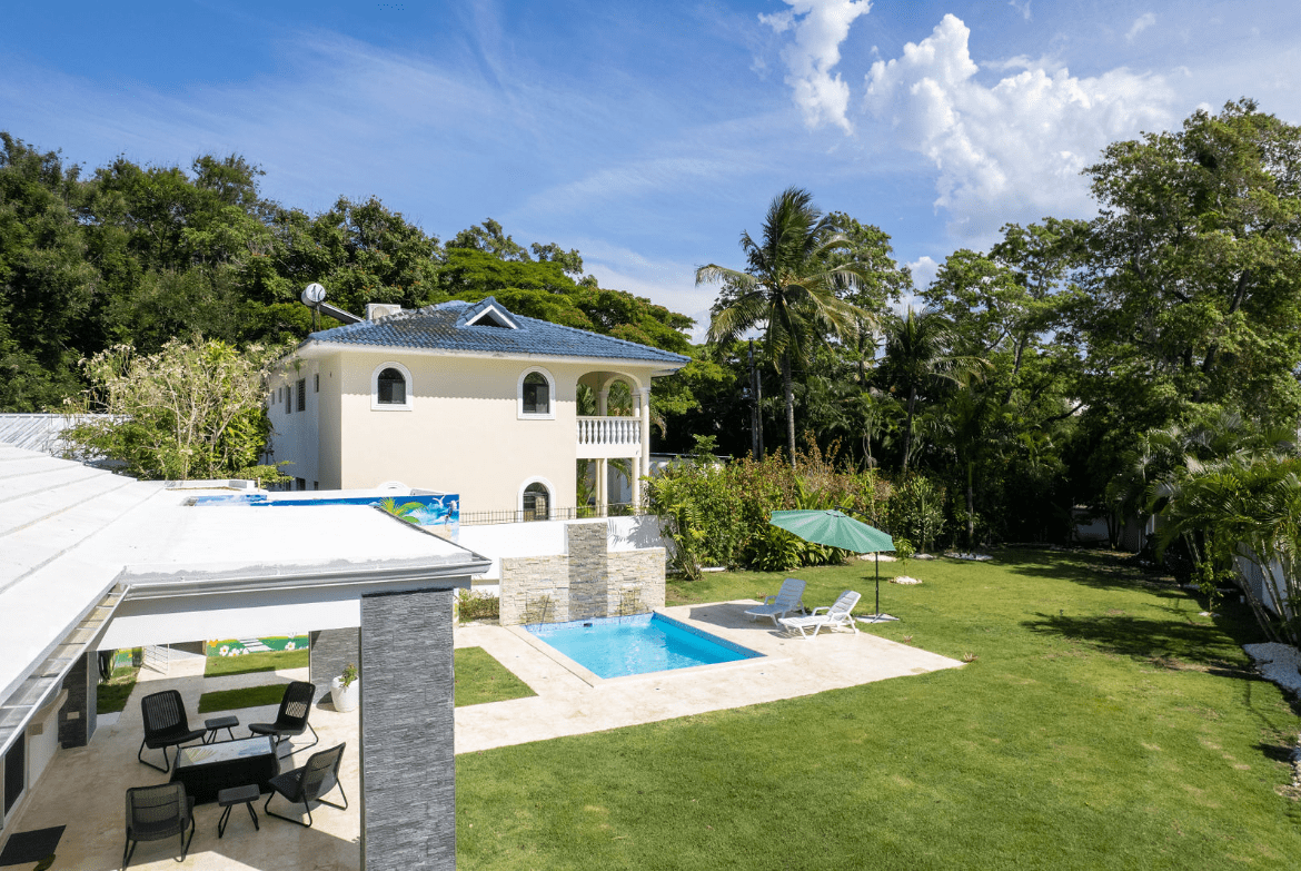 buyDRproperty Gorgeous 5 Bedroom Villa with pool and lush green lawn. Sosua Real Estate