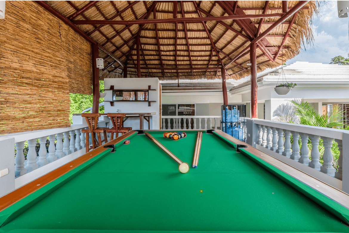 buyDRproperty Pool table in a gorgeous 5 bedroom villa outdoor entertainment area. Sosua Real Estate