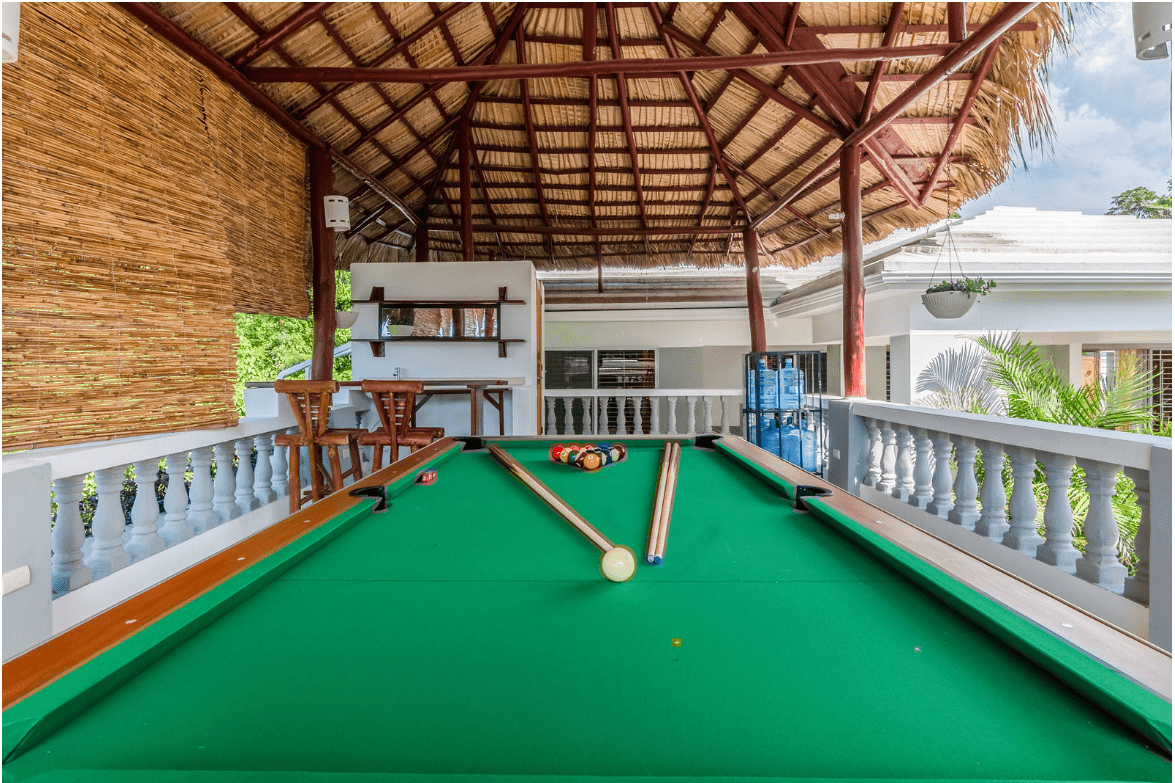 buyDRproperty Pool table in a gorgeous 5 bedroom villa outdoor entertainment area. Sosua Real Estate