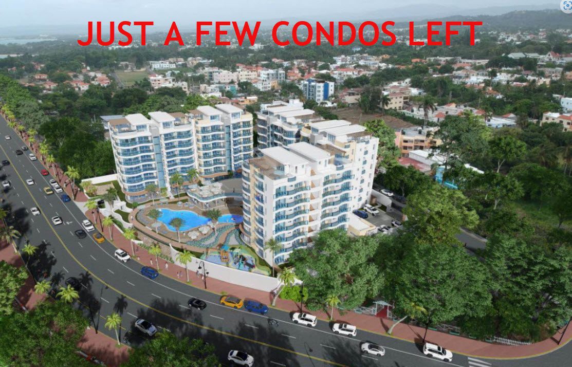 buyDRproperty Atlantic Luxury Towers in Dominican Republic. Condos for sale, "JUST A FEW CONDOS LEFT" text overlay. Sosua Real Estate