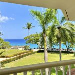 Buydrproperty Ocean View from a Balcony in Sosua Dominican Republic Palm Trees and Turquoise Water Sosua Real Estate Buydrpropertycom Buydrpropertycom