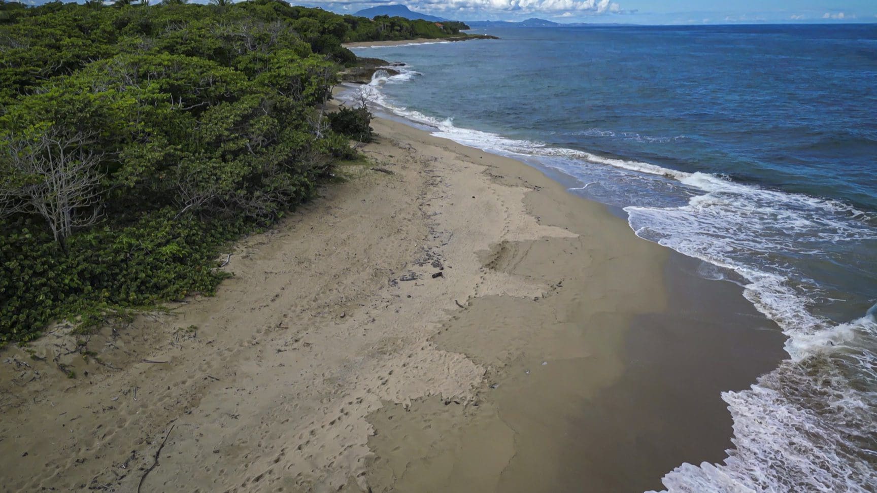 buyDRproperty Stunning oceanfront development property with sandy beach and clear blue water. Sosua Real Estate
