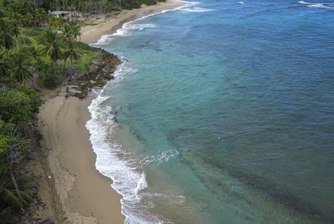 buyDRproperty Stunning oceanfront development property with turquoise water and sandy beach. Sosua Real Estate