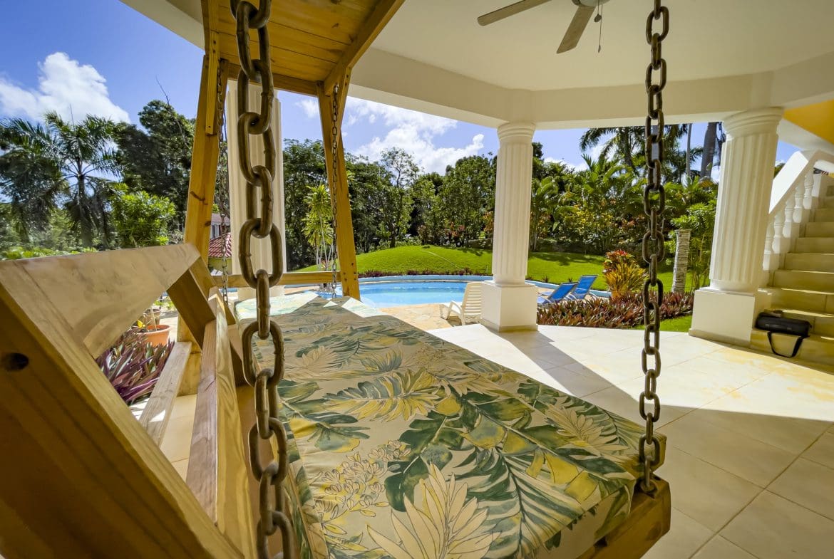 buyDRproperty Stunning 4 Bedroom Villa with swing bed overlooking pool and tropical views. Sosua Real Estate