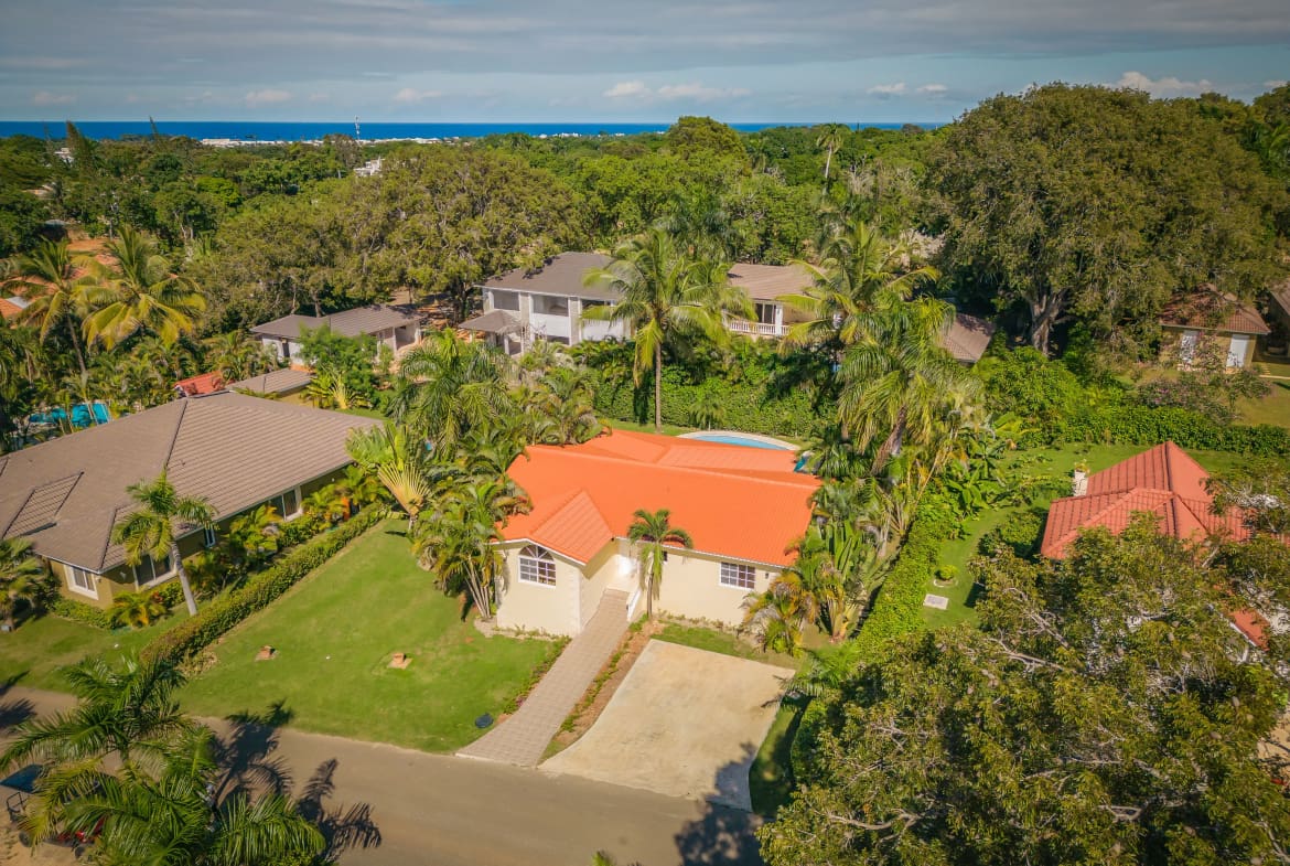 buyDRproperty Aerial view of Renovated Villa CAOBA in Residencial Hispaniola with ocean views. Sosua Real Estate