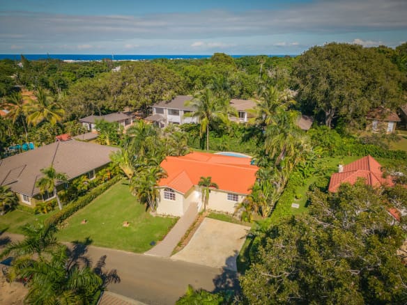 buyDRproperty Aerial view of Renovated Villa CAOBA in Residencial Hispaniola with ocean views. Sosua Real Estate