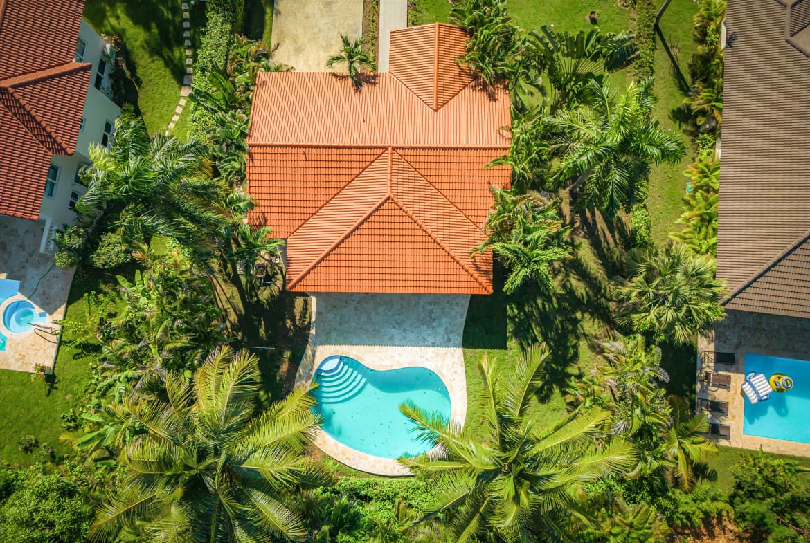 buyDRproperty Aerial view of Renovated Villa CAOBA with pool in lush Residencial Hispaniola Sosua Real Estate