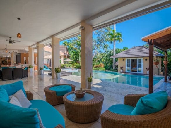 buyDRproperty Luxury outdoor living space at Villa PRECIOSA For Sale in Sea Horse Ranch with pool view. Sosua Real Estate