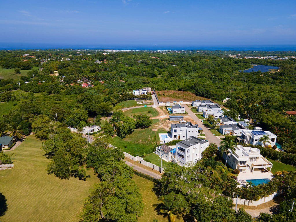 buyDRproperty Aerial view of a modern Countryside Villa For Sale with private pool in Villas Tisú. Sosua Real Estate