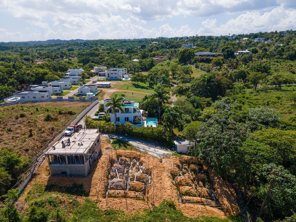 buyDRproperty Aerial view of a 3-Bedroom Oasis with a private pool in Sosua, Dominican Republic. Sosua Real Estate
