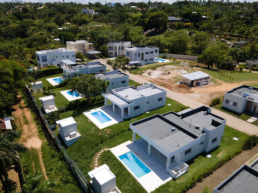 buyDRproperty Aerial view of a modern 3-bedroom oasis villa with a private pool in Sosua. Sosua Real Estate