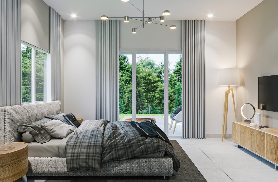 buyDRproperty Bedroom in a 3-Bedroom Oasis villa with a view of the garden. Sosua Real Estate