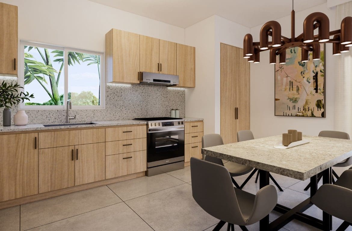 buyDRproperty Modern kitchen and dining area in a Countryside Villa For Sale, featuring light wood cabinets and a stylish chandelier. Sosua Real Estate