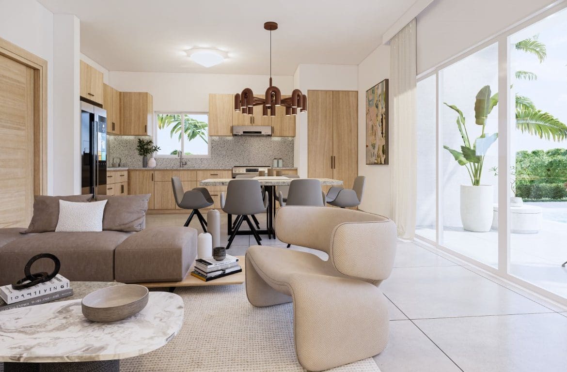 buyDRproperty Modern living room of a Countryside Villa For Sale, featuring a dining area and large windows. Sosua Real Estate