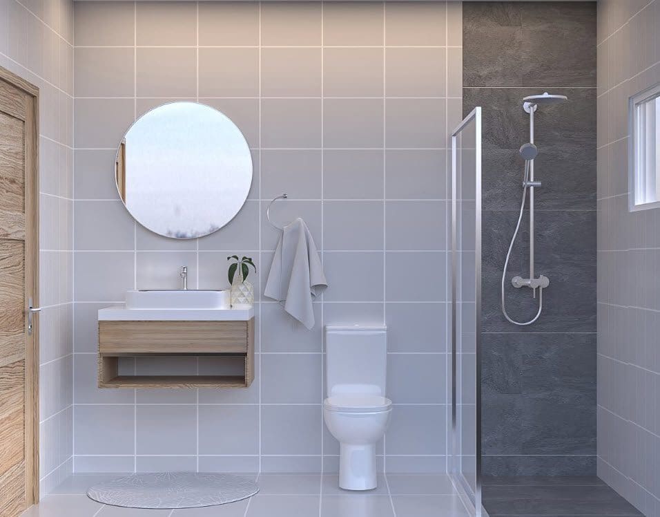 buyDRproperty Modern bathroom with a shower, toilet, and sink. Ideal for a condo for sale close to the beach. Sosua Real Estate