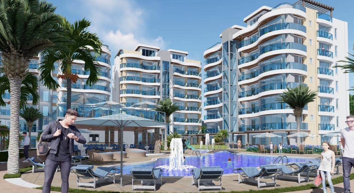 buyDRproperty Luxury condos in the Dominican Republic with pool and palm trees. Atlantic Luxury Towers. Sosua Real Estate