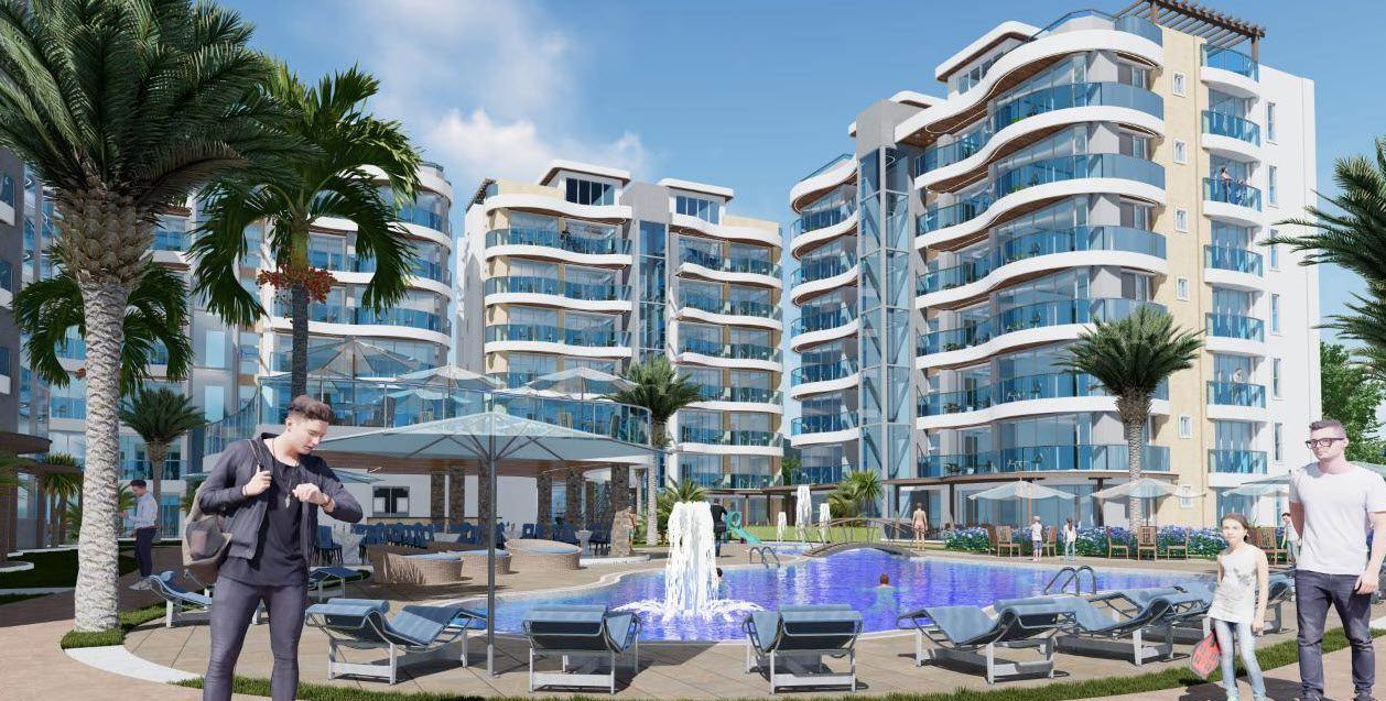 buyDRproperty Luxury condos in the Dominican Republic with pool and palm trees. Atlantic Luxury Towers. Sosua Real Estate