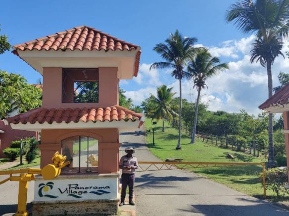 buyDRproperty Entrance to Panorama Village with security guard; Beautiful Building Lots For Sale. Sosua Real Estate