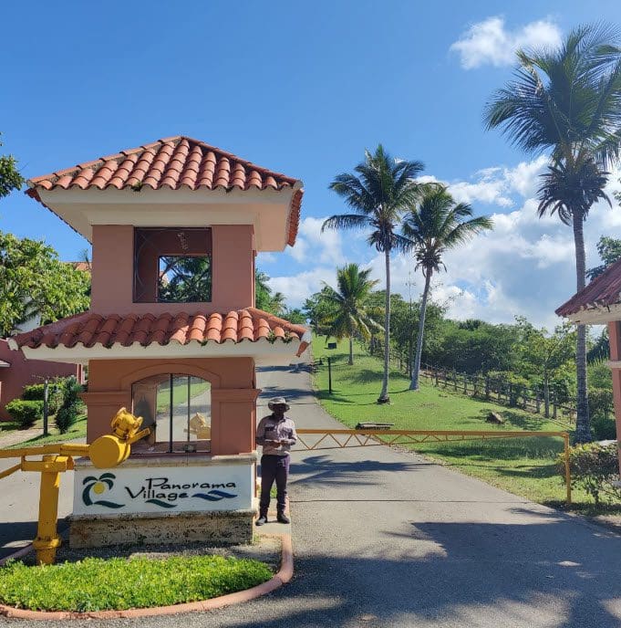 buyDRproperty Entrance to Panorama Village with security guard; Beautiful Building Lots For Sale. Sosua Real Estate