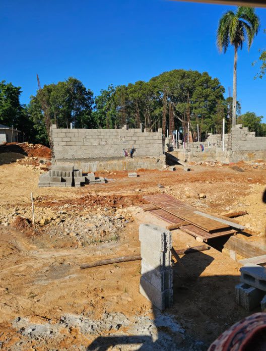buyDRproperty Construction site of a building, potentially on beautiful building lots. Sosua Real Estate