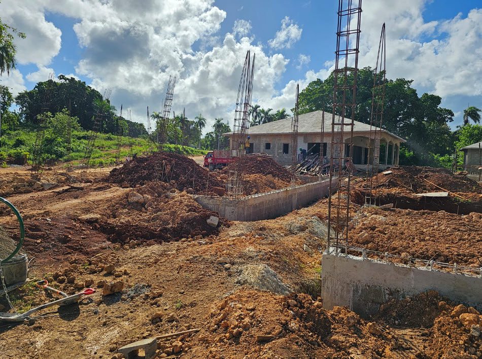 buyDRproperty Construction of beautiful building lots near Sosua. Rebar and foundation work in progress. Sosua Real Estate