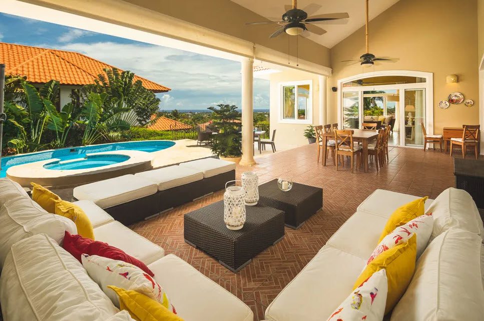 buyDRproperty Luxury outdoor living area with pool at a Beautiful 5 Bedroom Villa in Residential Hispaniola. Sosua Real Estate