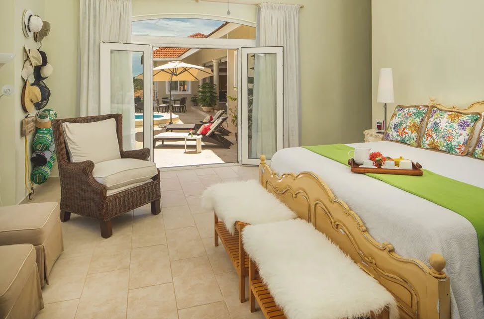 buyDRproperty Bedroom with an outdoor view of a beautiful 5 bedroom villa in Residential Hispaniola. Sosua Real Estate