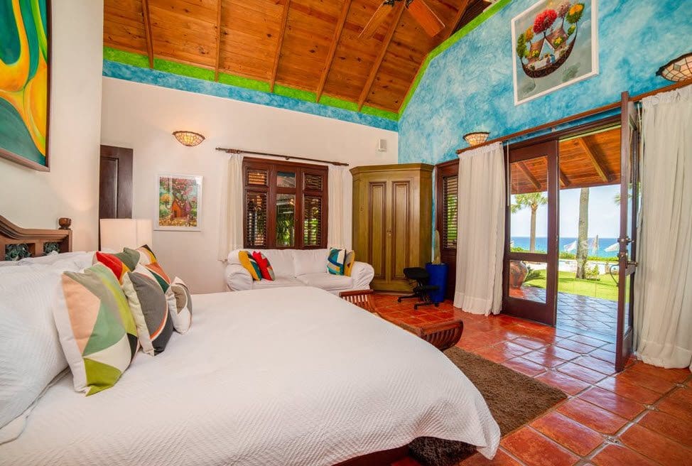 buyDRproperty Bedroom of a stunning oceanfront villa in the Dominican Republic with ocean views. Sosua Real Estate