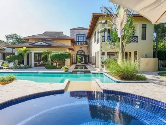 buyDRproperty Luxury villa WINDWARD in Sea Horse Ranch with pool and lush landscaping. Sosua Real Estate