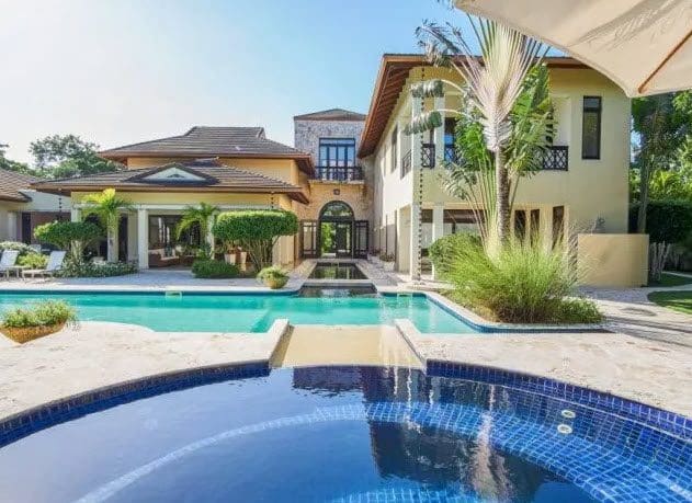 buyDRproperty Luxury villa WINDWARD in Sea Horse Ranch with pool and lush landscaping. Sosua Real Estate