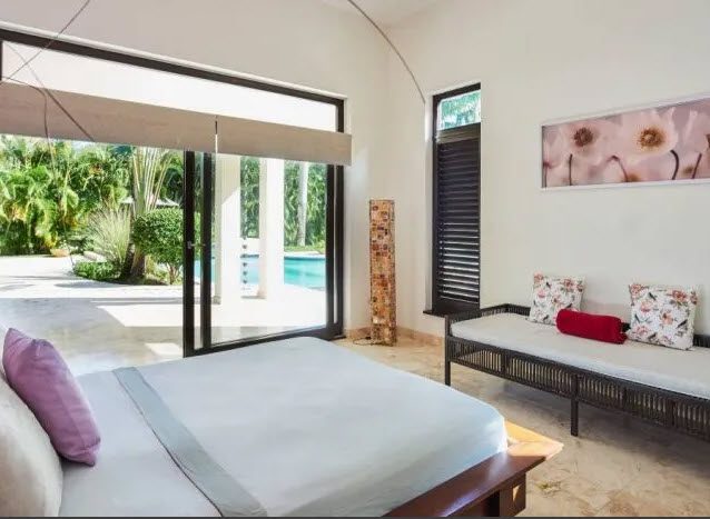 buyDRproperty Bedroom in Beautiful Villa WINDWARD in Sea Horse Ranch with pool view. Sosua Real Estate