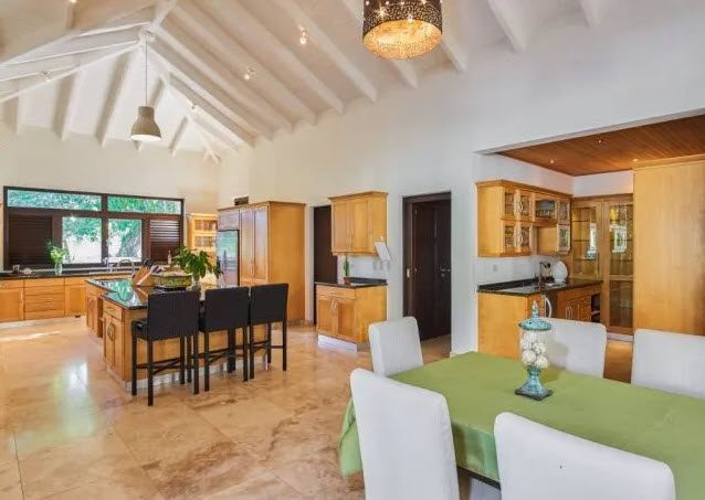 buyDRproperty Spacious kitchen and dining area in Beautiful Villa WINDWARD at Sea Horse Ranch. Sosua Real Estate