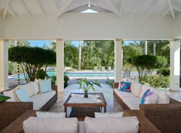 buyDRproperty Beautiful Villa WINDWARD in Sea Horse Ranch: outdoor living space with pool view. Sosua Real Estate