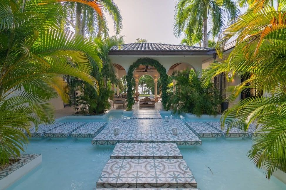 buyDRproperty Stunning Villa SUNSET at Sea Horse Ranch with water feature and palm trees. Sosua Real Estate