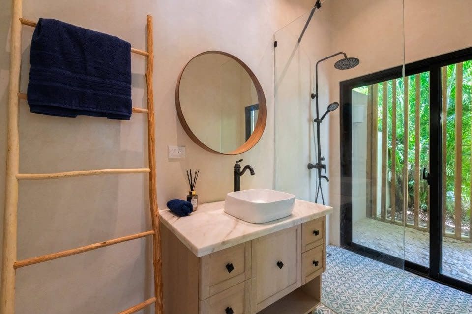 buyDRproperty Bathroom in Stunning Villa SUNSET with natural wood accents and outdoor views. Sosua Real Estate